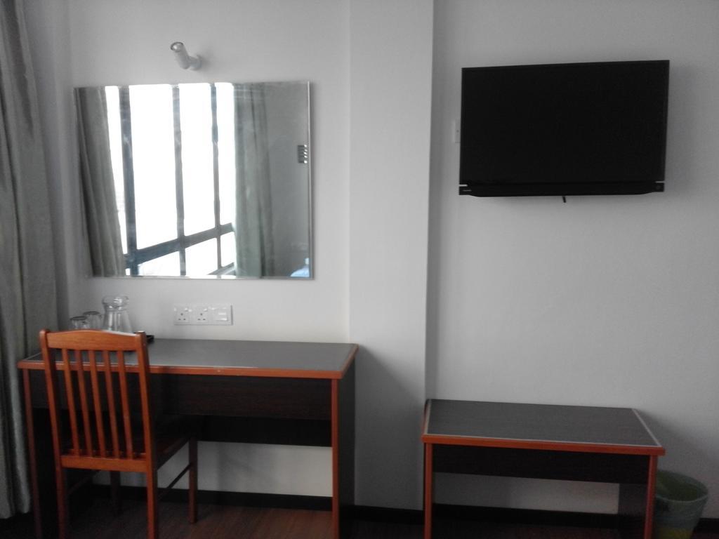 101 Hotel Miri Szoba fotó